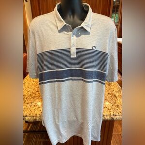Travis Mathew men’s golf polo. Sharp‎ grey with blue print & logos front/back.